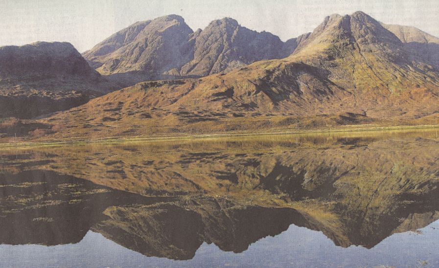 Blaven ( Bla Bheinn ) and Clach Glas from Loch Slapin on Isle of Skye in Western Islands of Scotland