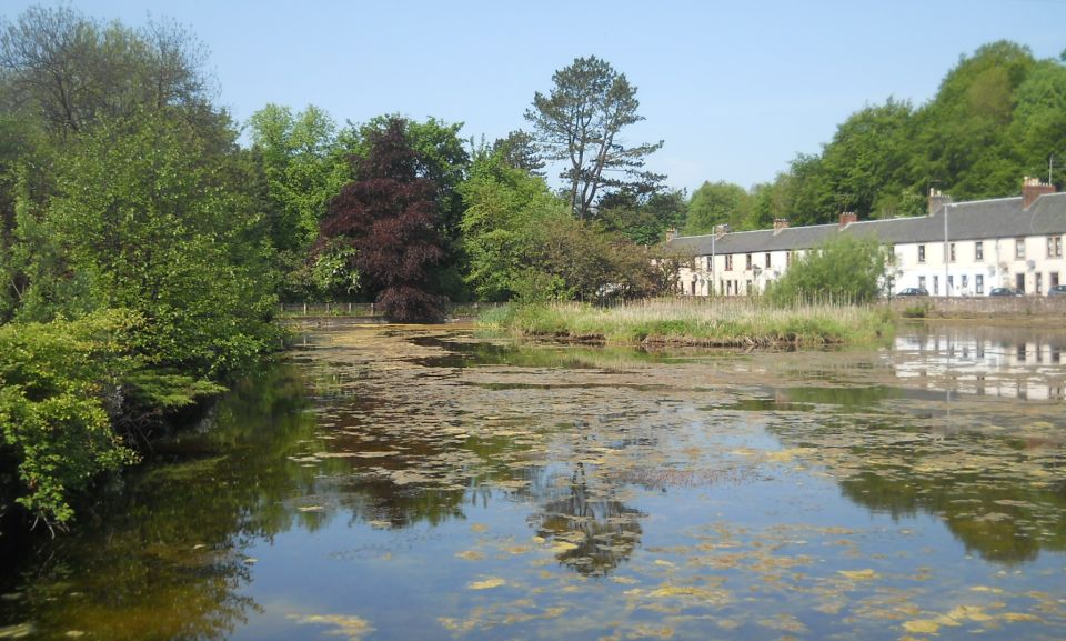 Voe ( reservoir ) and terraced houses at Catrine